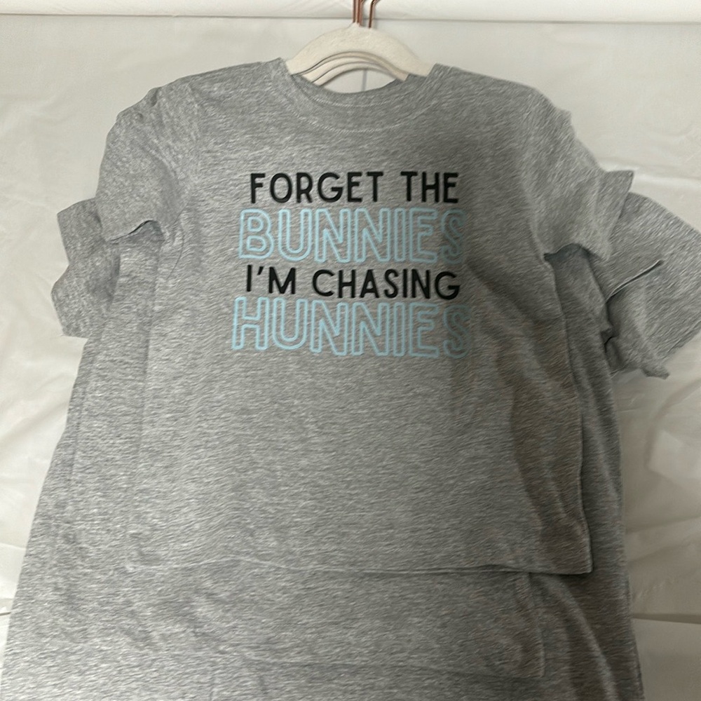 Kids tshirt “ forget the bunnies I’m chasing hunnies”